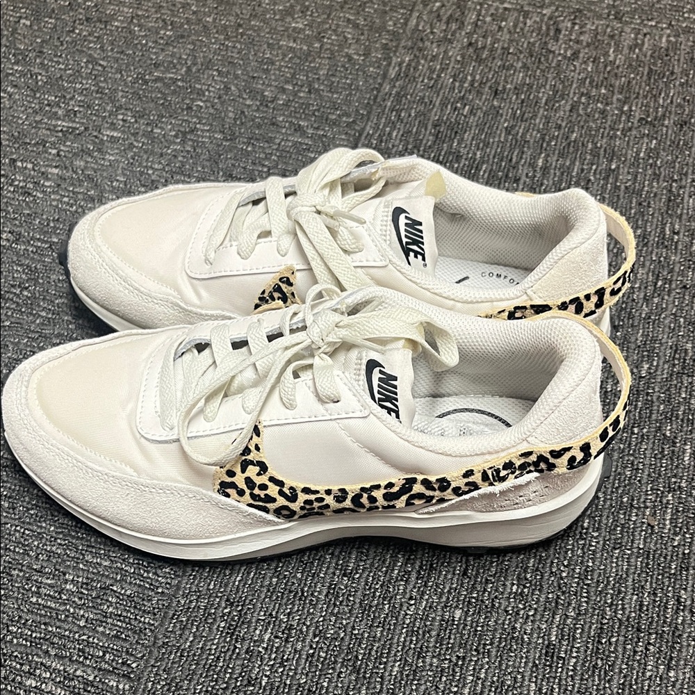 Nike Women's Cream White Sneakers with Leopard Swoosh